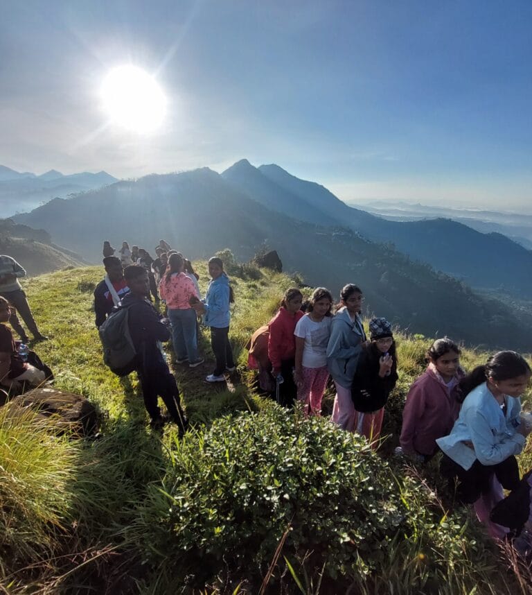 students Trekking trail in Munnar Kerala Tour Destination